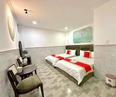 King Room with Two King Beds — Phú Gia Hotel near SECC & FV Hospital